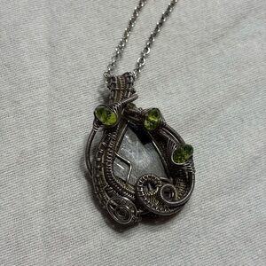 Meteorite pendant by artist Heather Jordan